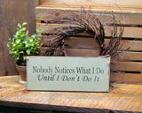 Nobody Notices What I Do Until I Don't Do It, Wooden Sign